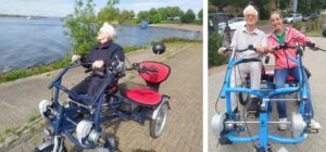 Arenda met een bewoner op de duofiets. Arenda maakte de overstap van de wijkverpleging naar de kleinschalige dementiezorg met dementiezorg van Dagelijks Leven. Daar heeft ze geen dag spijt van gehad!